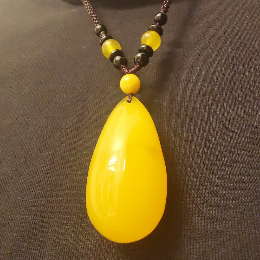 Rain drop like amber necklace.